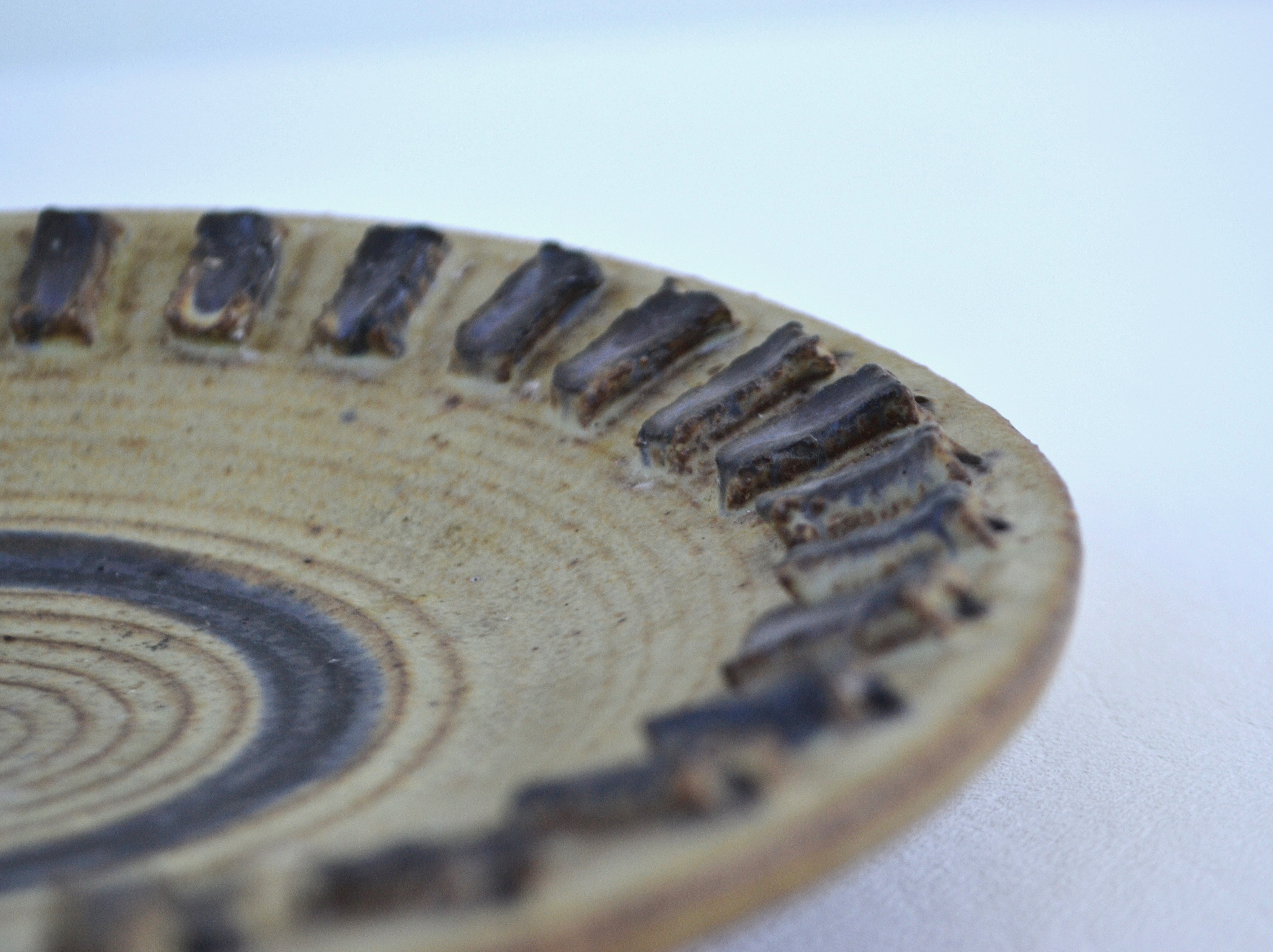 midcenturyhandthrowncreamandcharcoalgrayceramicbowlpmdgimage8.jpg